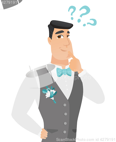 Image of Young caucasian groom with question marks.