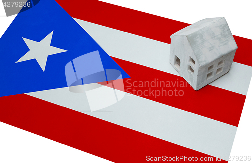 Image of Small house on a flag - Puerto Rico