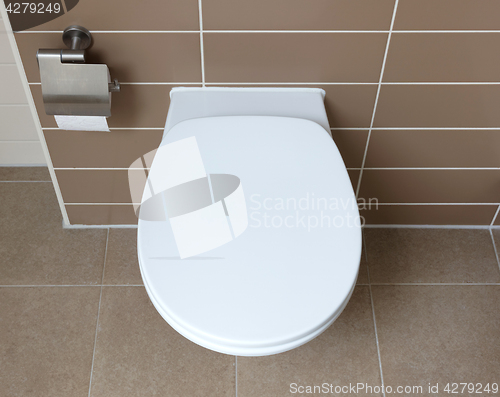 Image of White toilet bowl in the bathroom