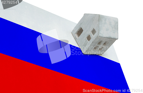 Image of Small house on a flag - Russia