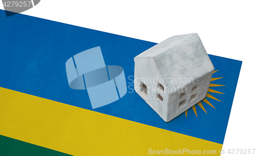 Image of Small house on a flag - Rwanda