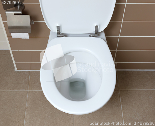 Image of White toilet bowl in the bathroom