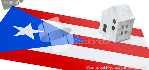 Image of Small house on a flag - Puerto Rico