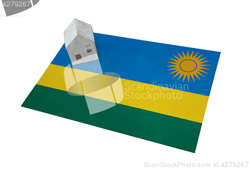 Image of Small house on a flag - Rwanda