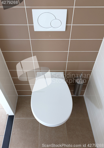 Image of White toilet bowl in the bathroom