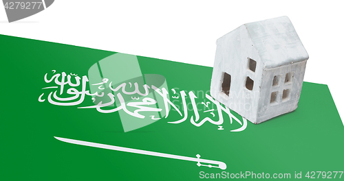 Image of Small house on a flag - Saudi Arabia