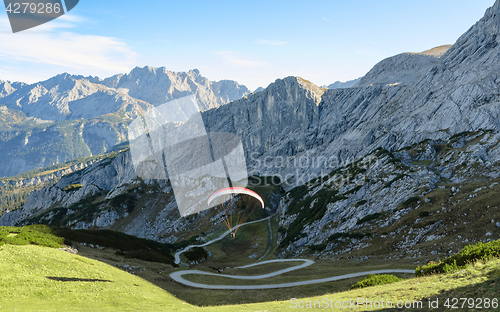 Image of Flying paraglider in Bavarian Alps