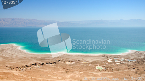 Image of Dead Sea lake with salt water and curative mud shores beaches