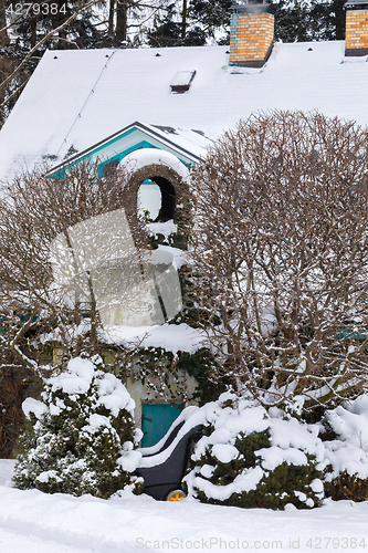 Image of beautiful winter garden covered by snow