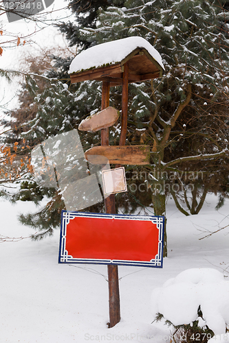 Image of signpost in winter garden