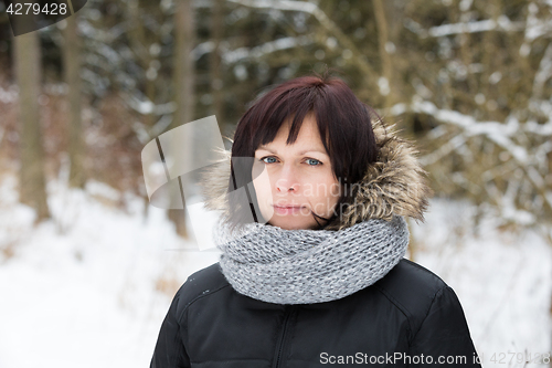 Image of woman without makeup in winter time