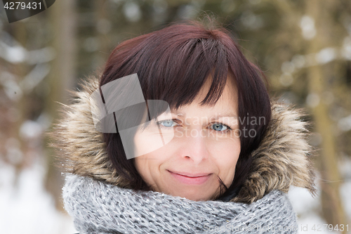Image of woman without makeup in winter time