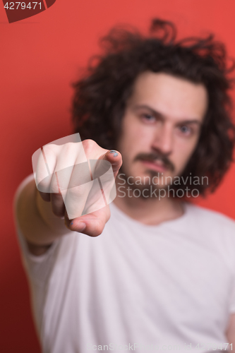 Image of young man with funny hair over color background