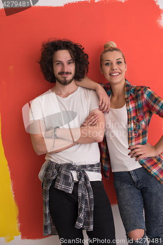 Image of couple in love  over color background