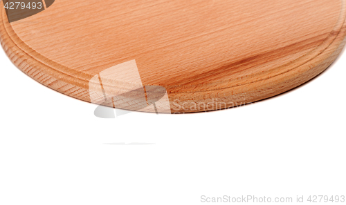 Image of Round wooden kitchen board on white background