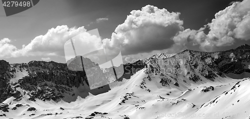 Image of Black and white panorama of snowy mountains in sun day
