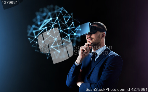 Image of businessman in virtual reality headset