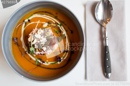 Image of close up of vegetable pumpkin-ginger soup in bowl