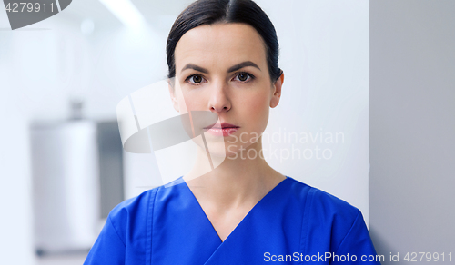 Image of doctor or nurse at hospital corridor