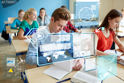 Image of group of students with books at school lesson