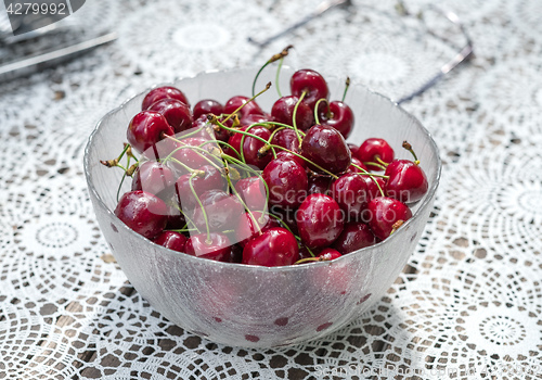 Image of Fresh cherries in a glass bowl