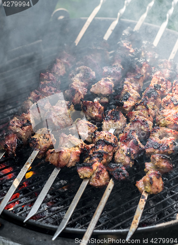 Image of Cooking shashlik barbecue on the grill