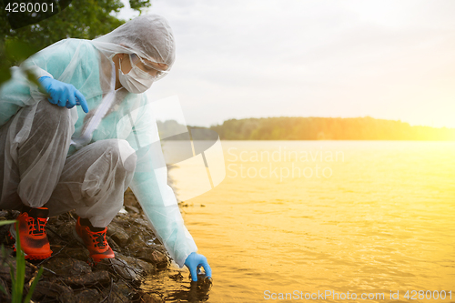 Image of Photo of chemist near river