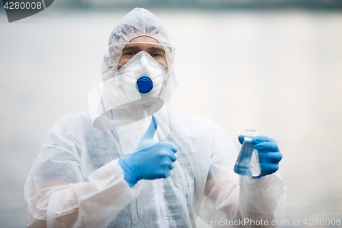 Image of Laboratory assistant with test tube