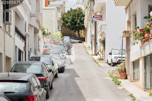 Image of Cars parked in the street