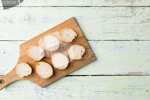 Image of Cut loaf on wooden table