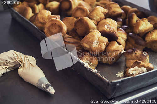 Image of Manual Eclairs production