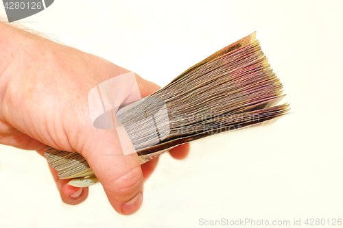 Image of Ukrainian money in the hand isolated