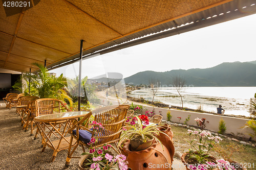 Image of Tables at a cafe next to lake