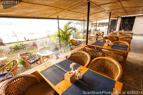 Image of Tables at a cafe next to lake