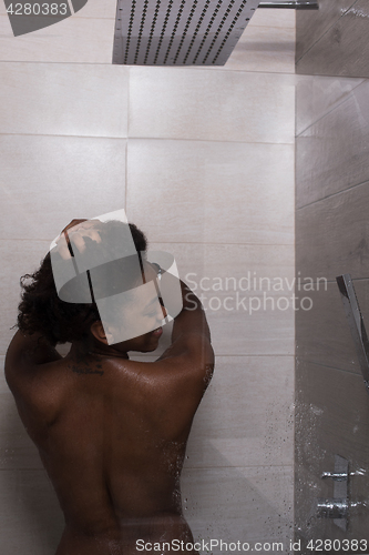 Image of African American woman in the shower