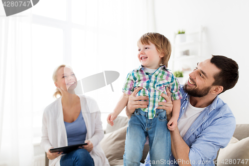 Image of happy family at home