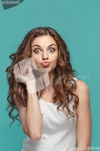 Image of The young woman\'s portrait with happy emotions