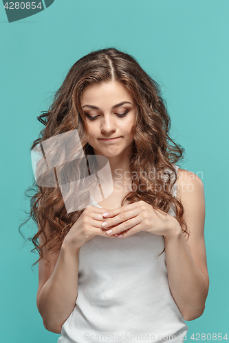 Image of The young woman\'s portrait with thoughtful emotions