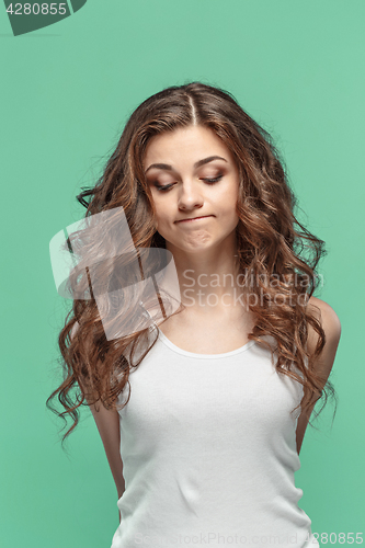 Image of The young woman\'s portrait with thoughtful emotions