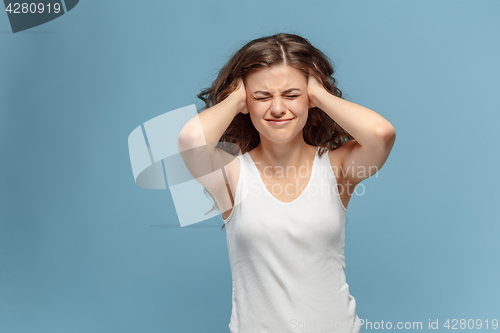 Image of The young woman\'s portrait with pain emotions