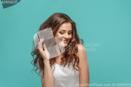 Image of The young woman\'s portrait with happy emotions