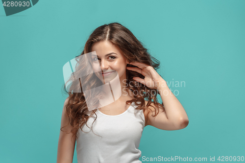 Image of The young woman\'s portrait with happy emotions