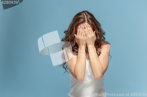 Image of The young woman\'s portrait with pain emotions
