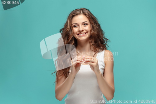 Image of The young woman\'s portrait with happy emotions