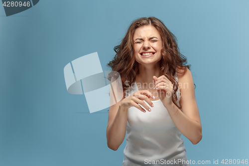 Image of The young woman\'s portrait with pain emotions