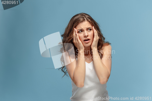 Image of The young woman\'s portrait with pain emotions