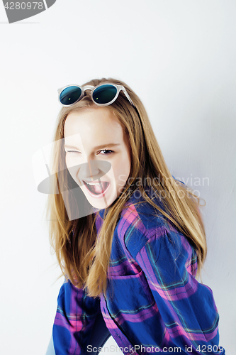 Image of young pretty teenage hipster girl posing emotional happy smiling on white background, lifestyle people concept 