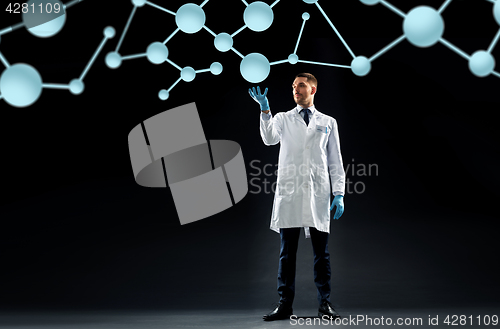 Image of scientist in lab coat with molecules