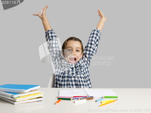 Image of Little girl making drawings