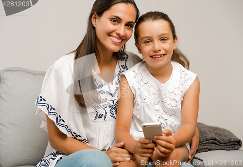 Image of Mother and Daughter at home